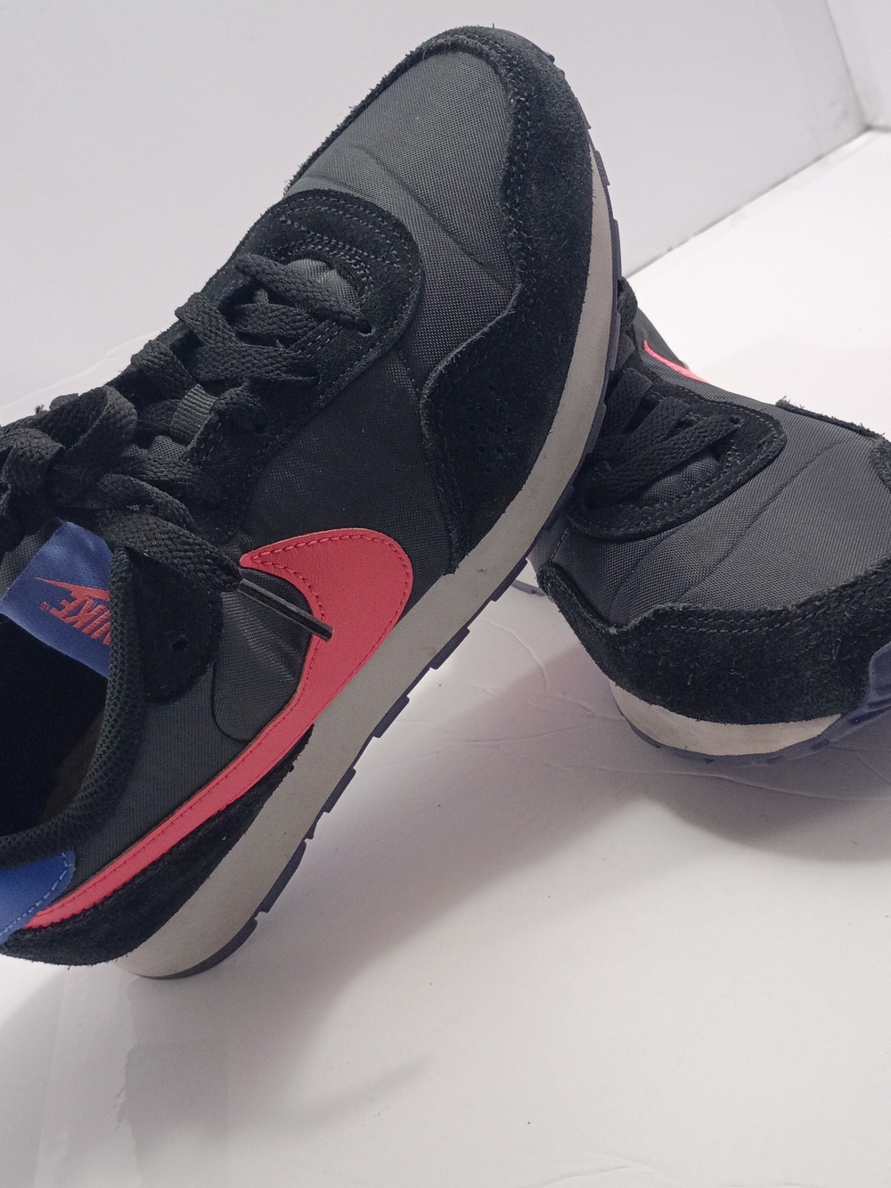 Nike Kids Black Sneakers with Pink Swoosh